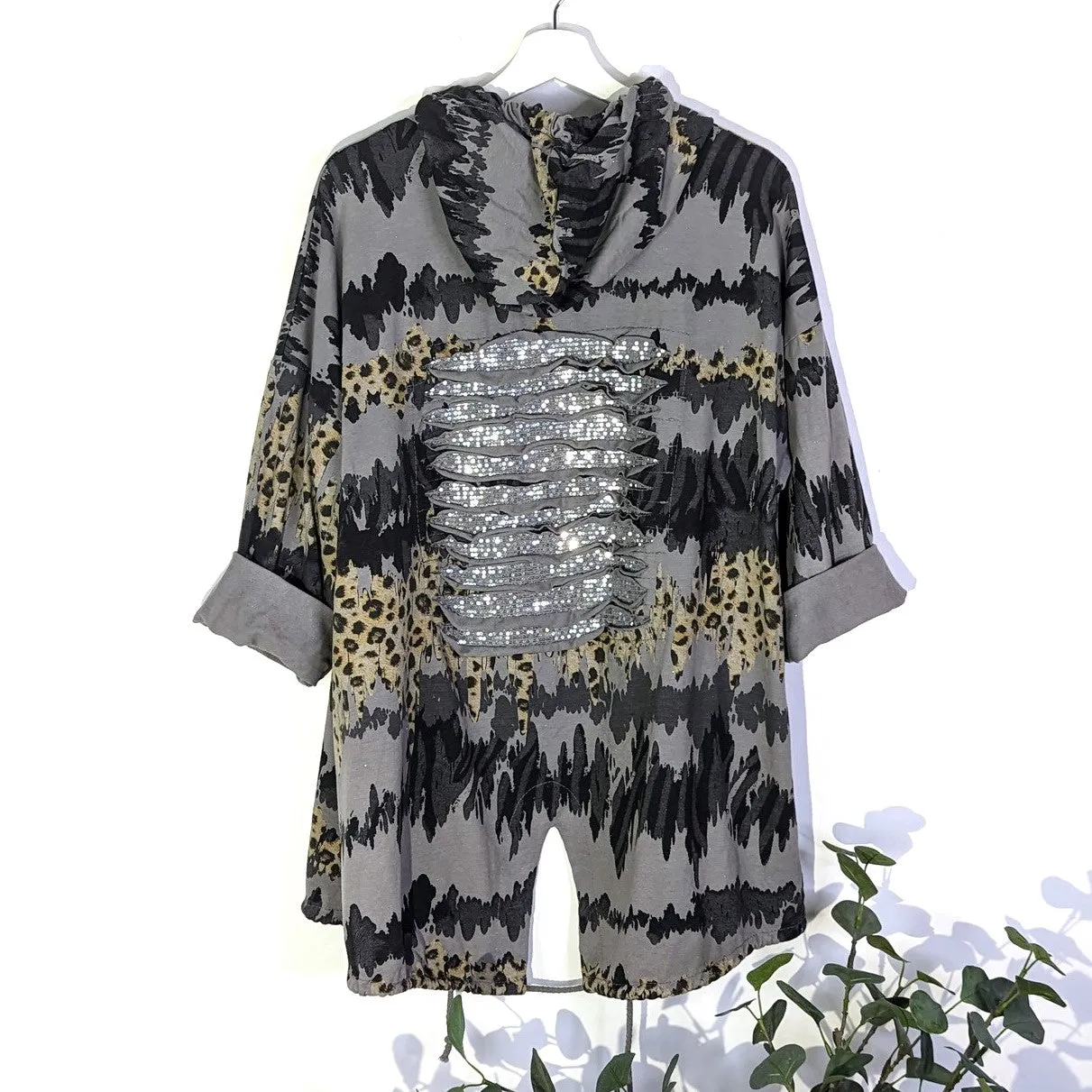 Distorted animal print hooded jacket with rip sequin detail