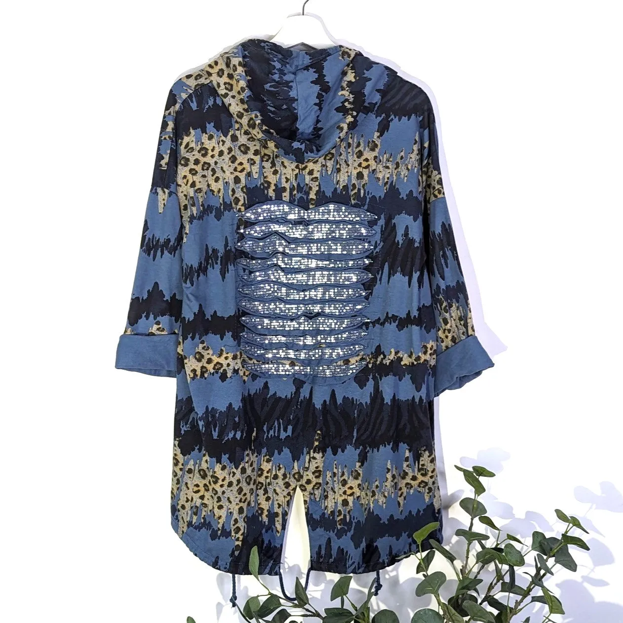 Distorted animal print hooded jacket with rip sequin detail